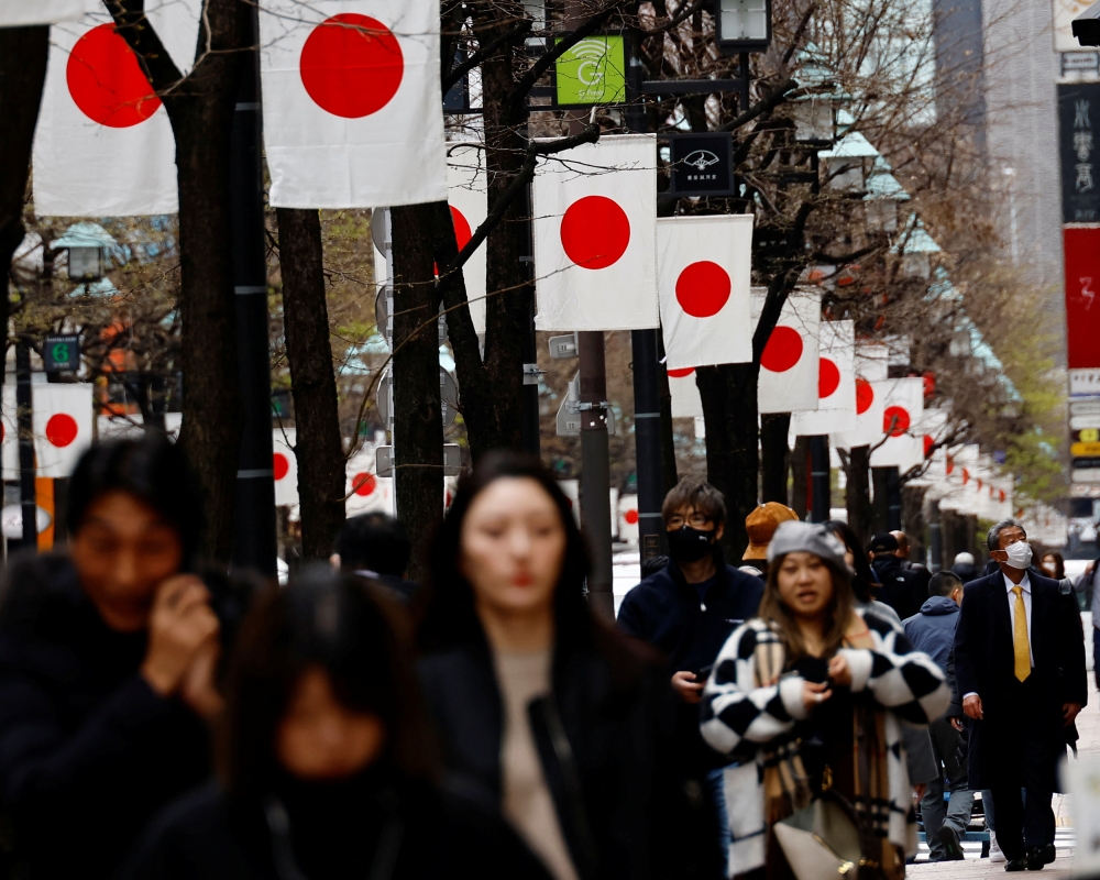Confidence among Japan’s largest manufacturers slipped after rising for three straight quarters but they remain positive, a key survey showed today. — Reuters pic