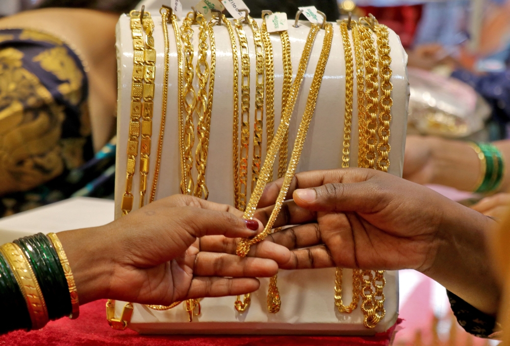 Gold hit another fresh record high today as investors grow confident that the Federal Reserve will cut interest rates this year, even after data showed a slight uptick in a key inflation report. — Reuters file pic
