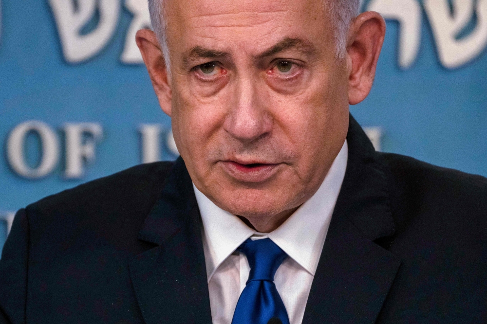  Israeli Prime Minister Benjamin Netanyahu is said to be 'very well' after his hernia operation. — AFP pool pic