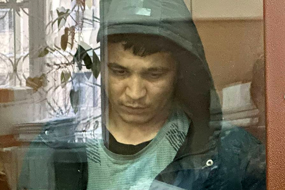 This handout photograph taken and released by the Basmanny District Court press service on April 1, 2024 shows Yakubdjoni Yusufzody, suspected of taking part in the attack of a concert hall that killed at least 144 people and wounded dozens more, standing inside the defendant cage as he waits for his pre-trial detention hearing in Moscow. — Handout / Basmanny District Court / AFP pic