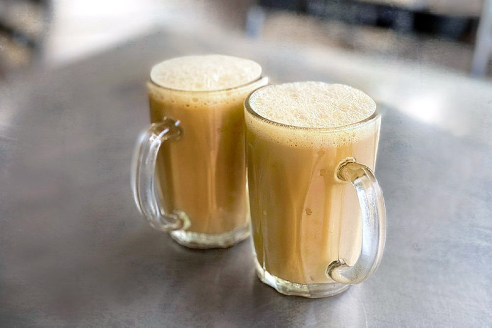 'Teh tarik' or hand pulled tea is the default beverage order.