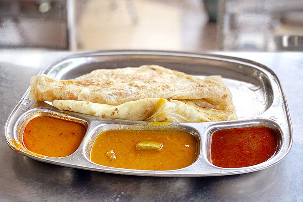 The classic 'roti kosong' or plain 'roti canai'.