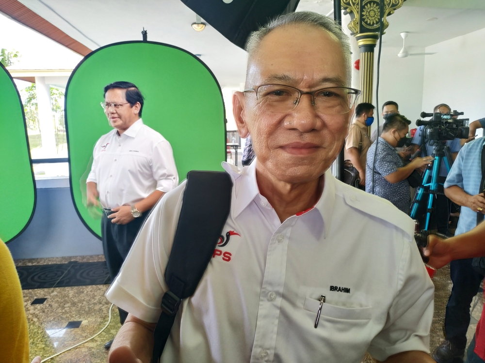 Satok assemblyman Datuk Ibrahim Baki condemned the act of firebombing KK Mart outlet at Jalan Satok in the strongest terms where it can be described as an attempt at terrorism. — Picture by Sulok Tawie