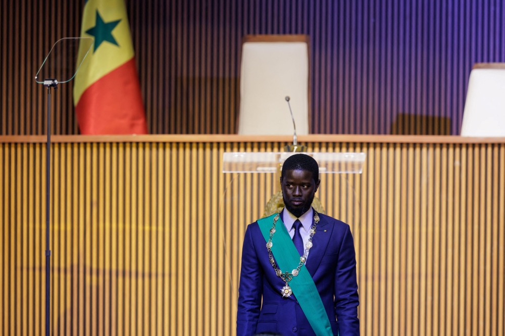 Senegal's Newly elected President Bassirou Diomaye Faye stands after he is sworn in as Senegal's president, during the inauguration ceremony in Dakar, Senegal April 2, 2024. — Reuters pic