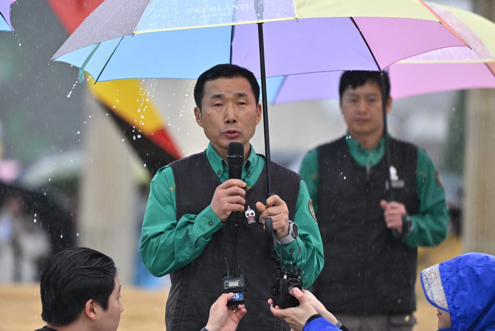 South Korean zookeeper Kang Cheol-won speaks during a farewell ceremony for giant panda Fu Bao at Everland amusement park in Yongin on April 3, 2024. — AFP pic