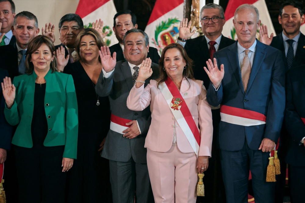 President of Peru Dina Boluarte poses with her newly appointed state ministers after a swearing in ceremony in Lima, Peru April 1, 2024. — Reuters pic