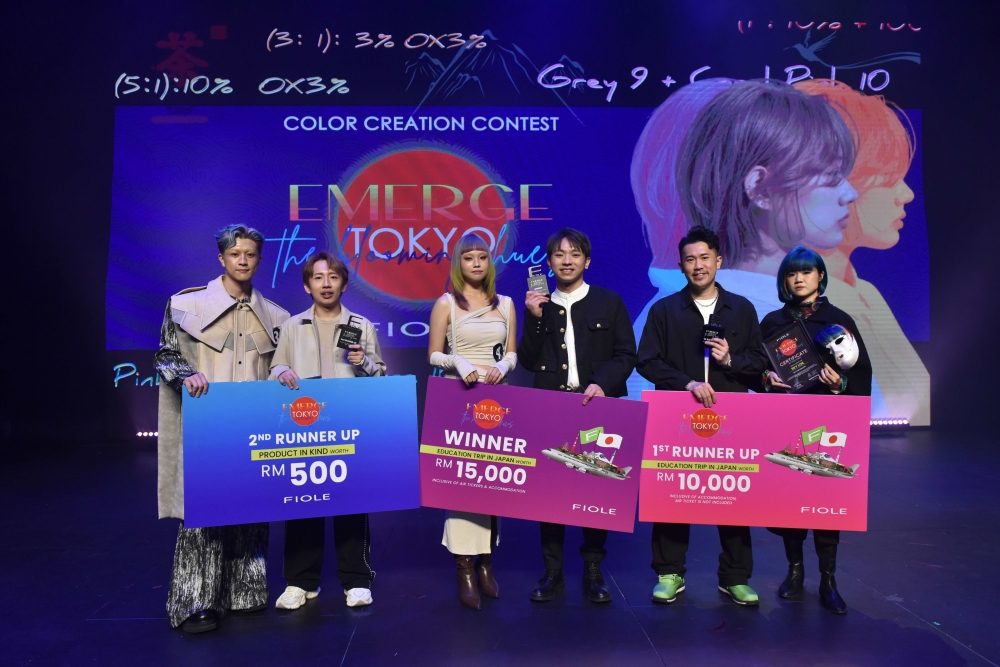 Winners of the hair colouring competition. The champion was Henry Choong (centre). — Picture courtesy of R Beaute