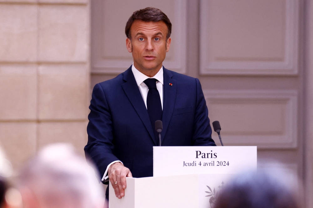 French President Emmanuel Macron delivers a speech during a press conference with Austrian Chancellor Karl Nehammer (not pictured) before their working lunch at Elysee Palace in Paris, France, April 4, 2024. — Reuters pool pic