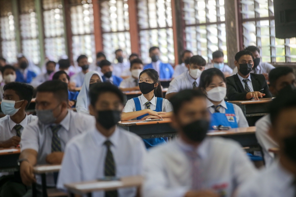 According to the writer, today a student finishing her SPM exam and entering college may face something of a culture shock. ― Picture by Farhan Najib