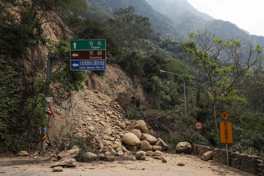 This photo taken by Taiwan’s Central News Agency (CNA) on April 4, 2024 shows a road blocked by fallen rocks in Hualien. — AFP pic/CNA