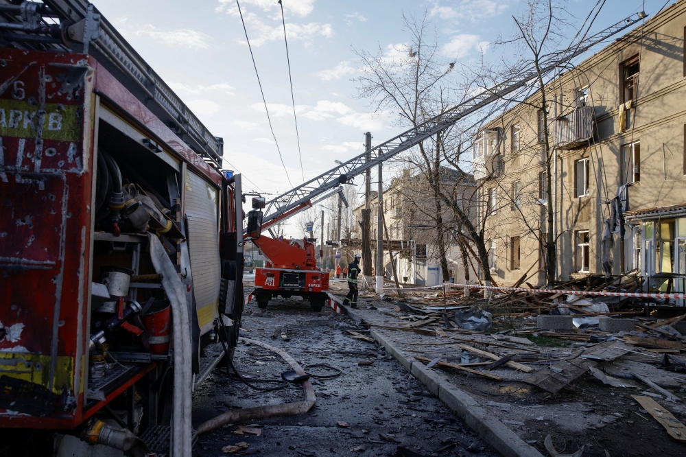A rescuer works at a site of a Russian drone strike, amid Russia's attack on Ukraine, in Kharkiv, Ukraine April 4, 2024. ― Reuters pic