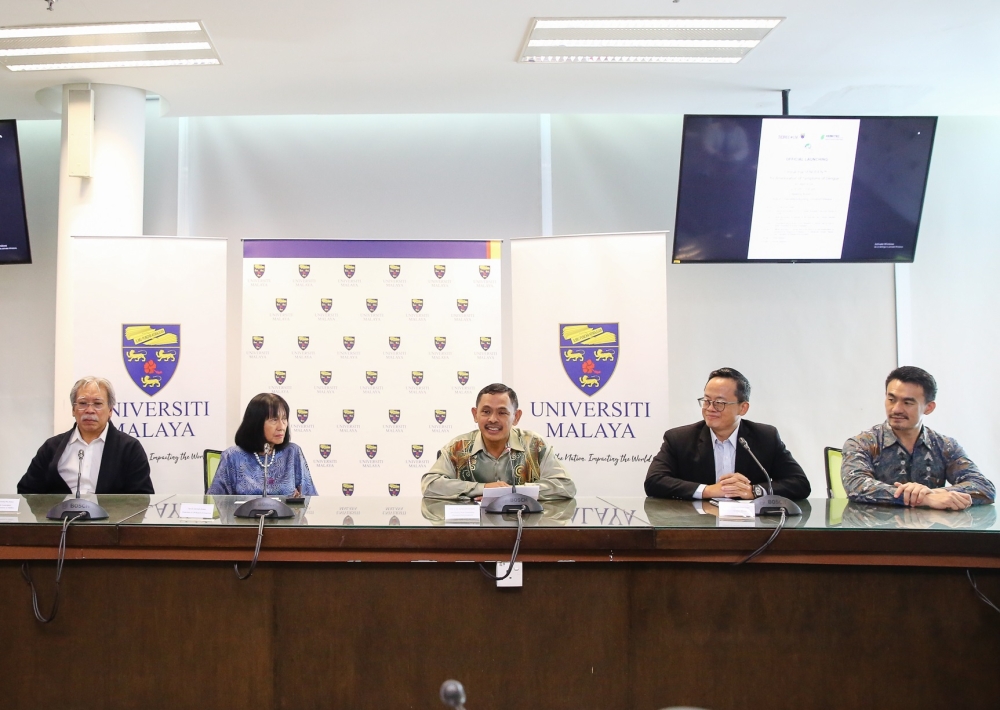 Tidrec executive director Prof Dr Sazaly, UM chairman Tan Sri Zarinah Anwar, UM deputy vice-chancellor (Research and Innovation) Prof Kaharudin, Herbitec (M) Sdn Bhd director Sherman Lam and Tanco Holdings Berhad executive director Christopher at the launch of the clinical trial. —  Picture by Yusof Mat Isa