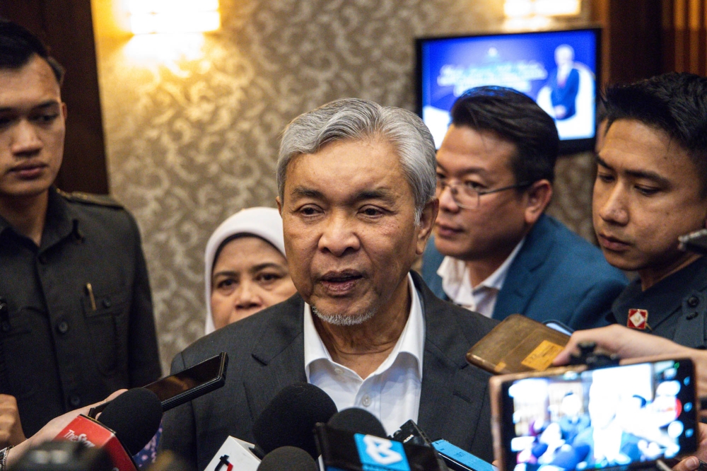 Deputy Prime Minister Datuk Seri Ahmad Zahid Hamidi reminded the public of the importance of thorough preparations, including proper vehicle maintenance and meticulous travel planning, to ensure a safe and smooth journey for everyone. — Picture by Firdaus Latif