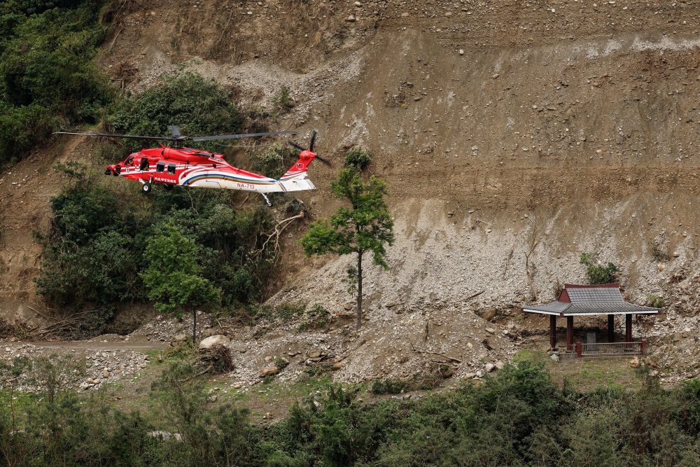 A rescue helicopter brings people back from a mountainous area in Taroko National Park, following the earthquake, in Hualien April 6, 2024. — Reuters pic  