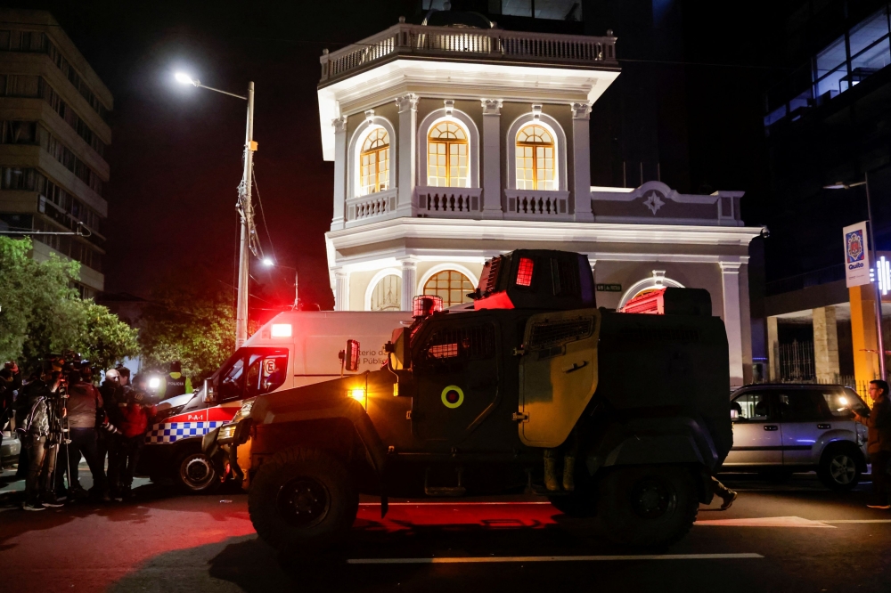 A military vehicle is parked outside the Flagrancy Unit, where former Ecuador Vice President Jorge Glas is believed to be detained, in Quito April 6, 2024. — Reuters pic