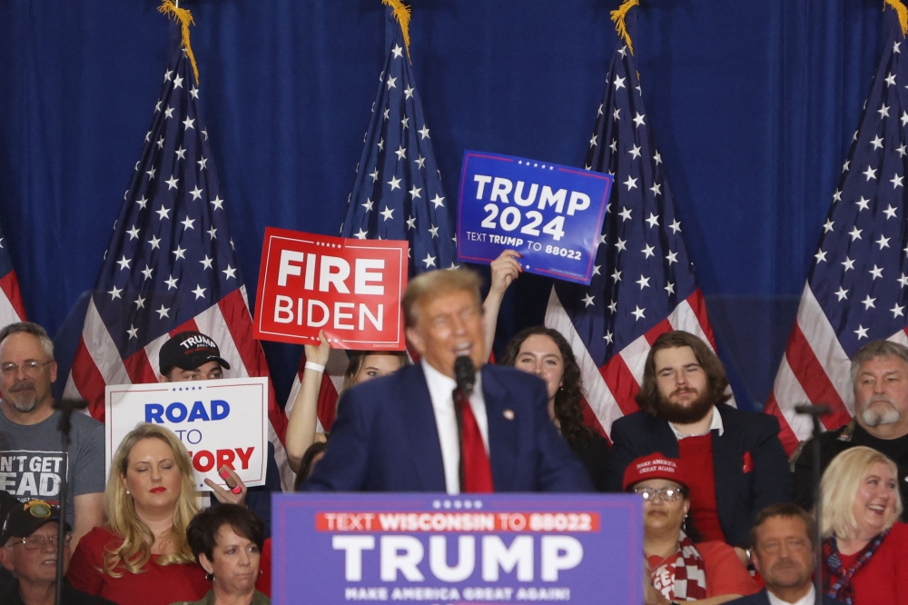 File photo of former US President and 2024 presidential hopeful Donald Trump speaking during a campaign rally at the Hyatt Regency in Green Bay, Wisconsin, on April 2, 2024. — AFP pic