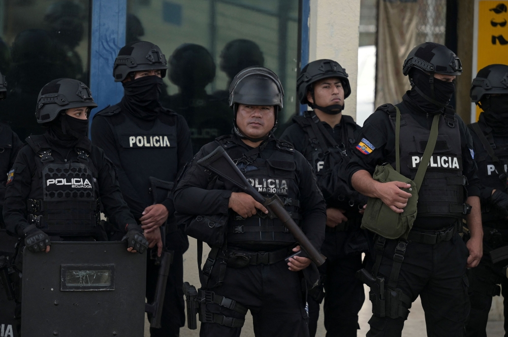Police officers stand guard as Ecuador’s former Vice President Jorge Glas is expected to arrive at the La Roca Prison, after Ecuadorean forces raided Mexico’s embassy to arrest Glas who had been convicted twice of corruption and who had been granted asylum by Mexican authorities, in Guayaquil, Ecuador April 7, 2024. — Reuters pic