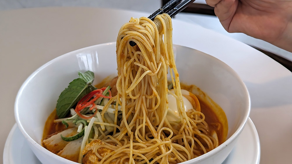 Laksa Lemak here uses angel hair pasta instead of rice noodles, to great effect.
