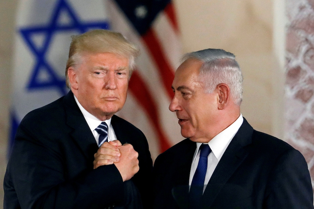 File photo of US President Donald Trump and Israeli Prime Minister Benjamin Netanyahu shaking hands after Trump's address at the Israel Museum in Jerusalem May 23, 2017. - Reuters pic