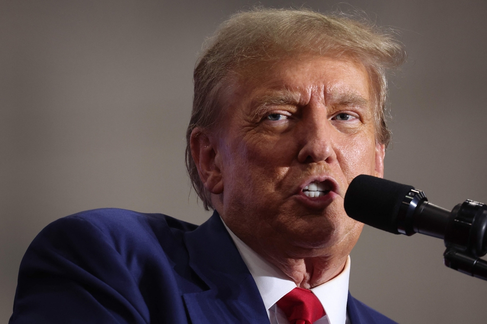 File photo of former President Donald Trump speaking to guests at a rally on April 02, 2024 in Green Bay, Wisconsin. — AFP pic