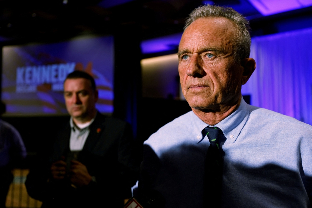 File photo of Robert F. Kennedy Jr. listens to a question from the media after his rally in Raleigh, North Carolina January 12, 2024. — Reuters pic