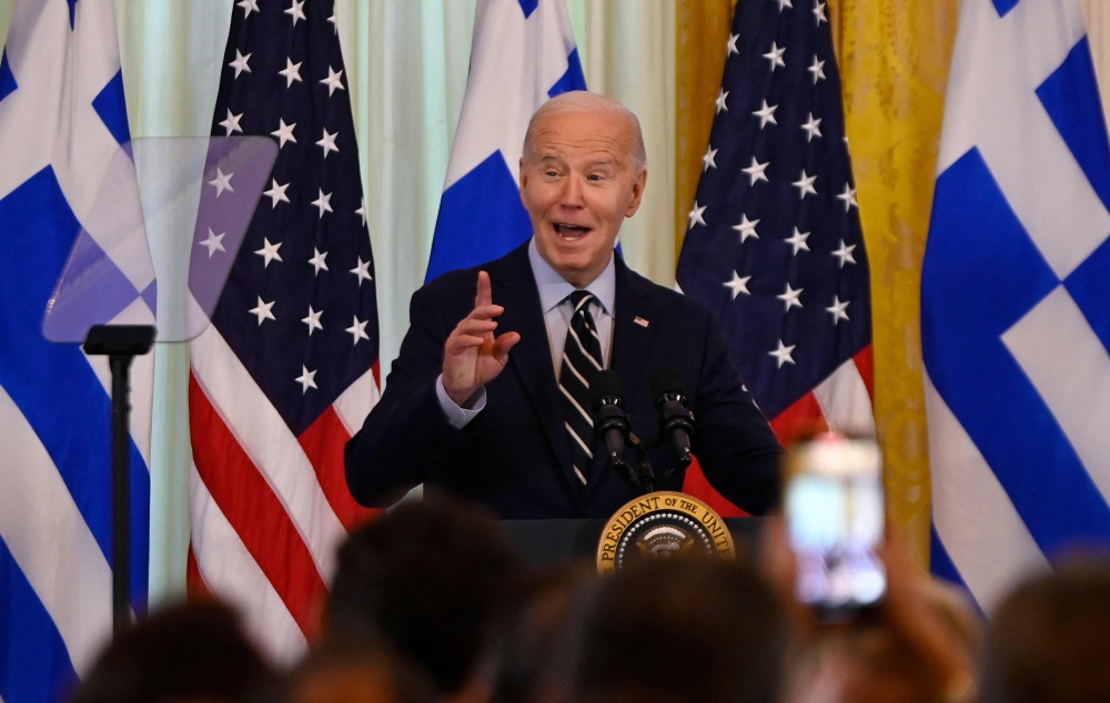 File photo of US President Joe Biden speaking at a reception to celebrate Greek Independence Day in the East Room of the White House in Washington, DC, on April 4, 2024. — AFP pic