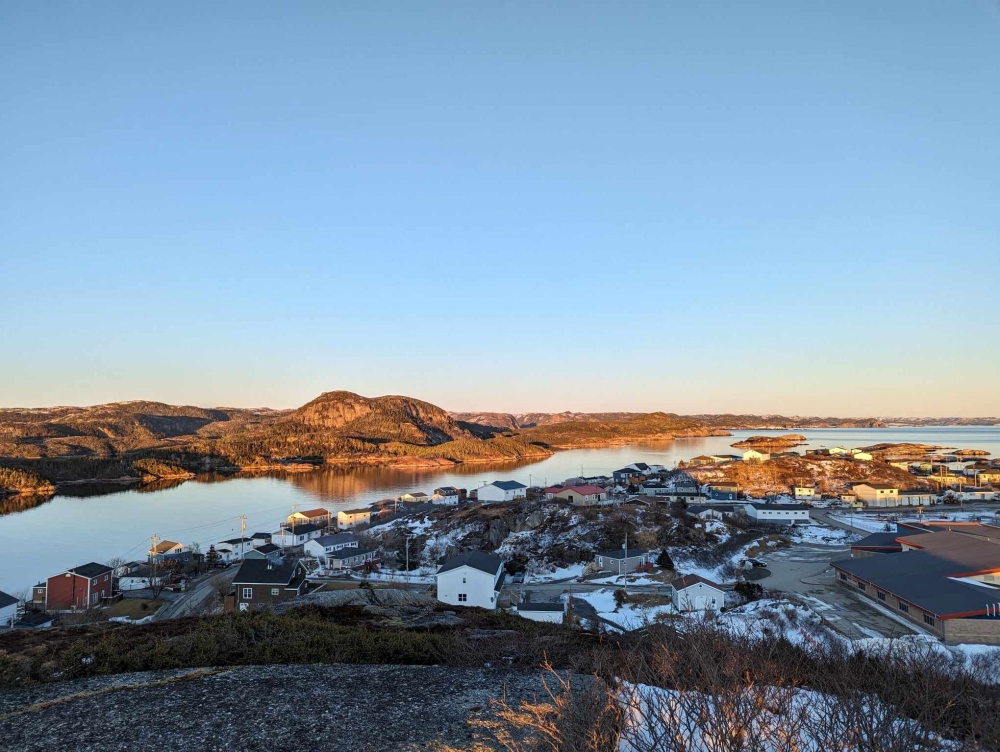 A view from the top of Maiden Tea Hill overlooks the seaside town of Burgeo, with the small Eclipse Island, named by Royal Navy explorer Captain James Cook in 1766, at top right in Newfoundland, Canada February 7, 2024. — Melissa Mills handout pic via Reuters 