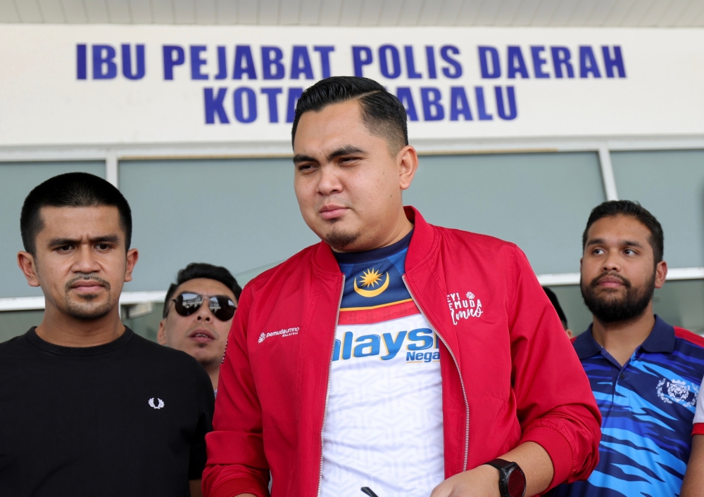 Umno Youth chief Dr Muhamad Akmal Saleh speaks to the media at the Kota Kinabalu district police headquarters, April 5, 2024. — Bernama pic 