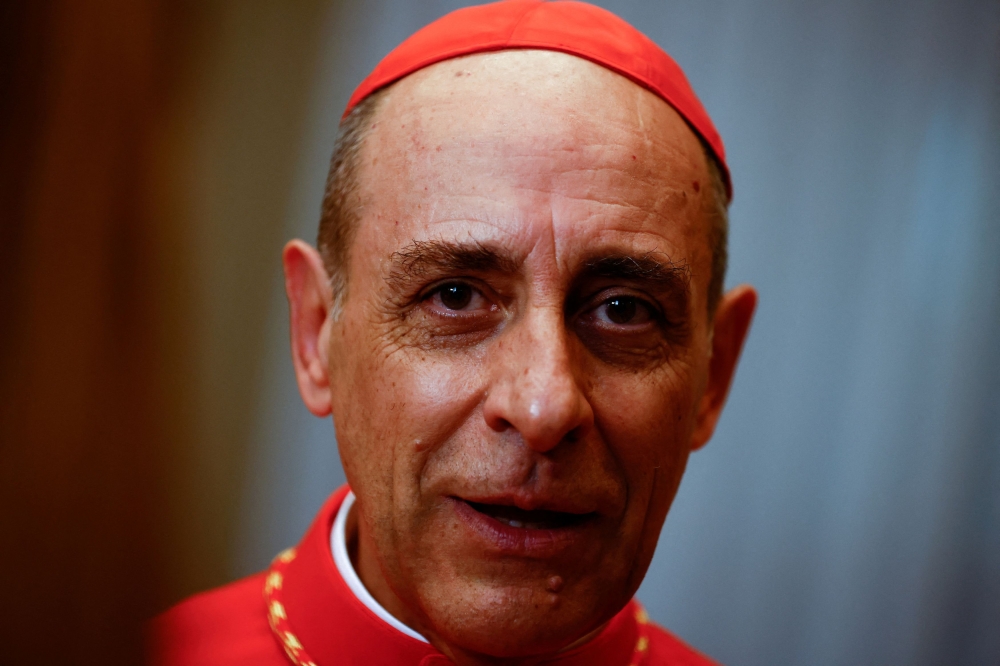 The Vatican also said via the head of the DDF, Cardinal Victor Manuel Fernandez (pic), that it opposed the anti-LGBTQ laws enforced by a number of countries with the support of local Catholic groups. — Reuters pic