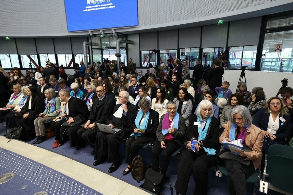 Representatives and lawyers of three climate change cases involving France, Portugal and Switzerland attend a hearing of the European Court of Human Rights (ECHR) to decide in three separate cases if states are doing enough in the face of global warming in rulings that could force them to do more, in Strasbourg, eastern France, on April 9, 2024. — AFP pic