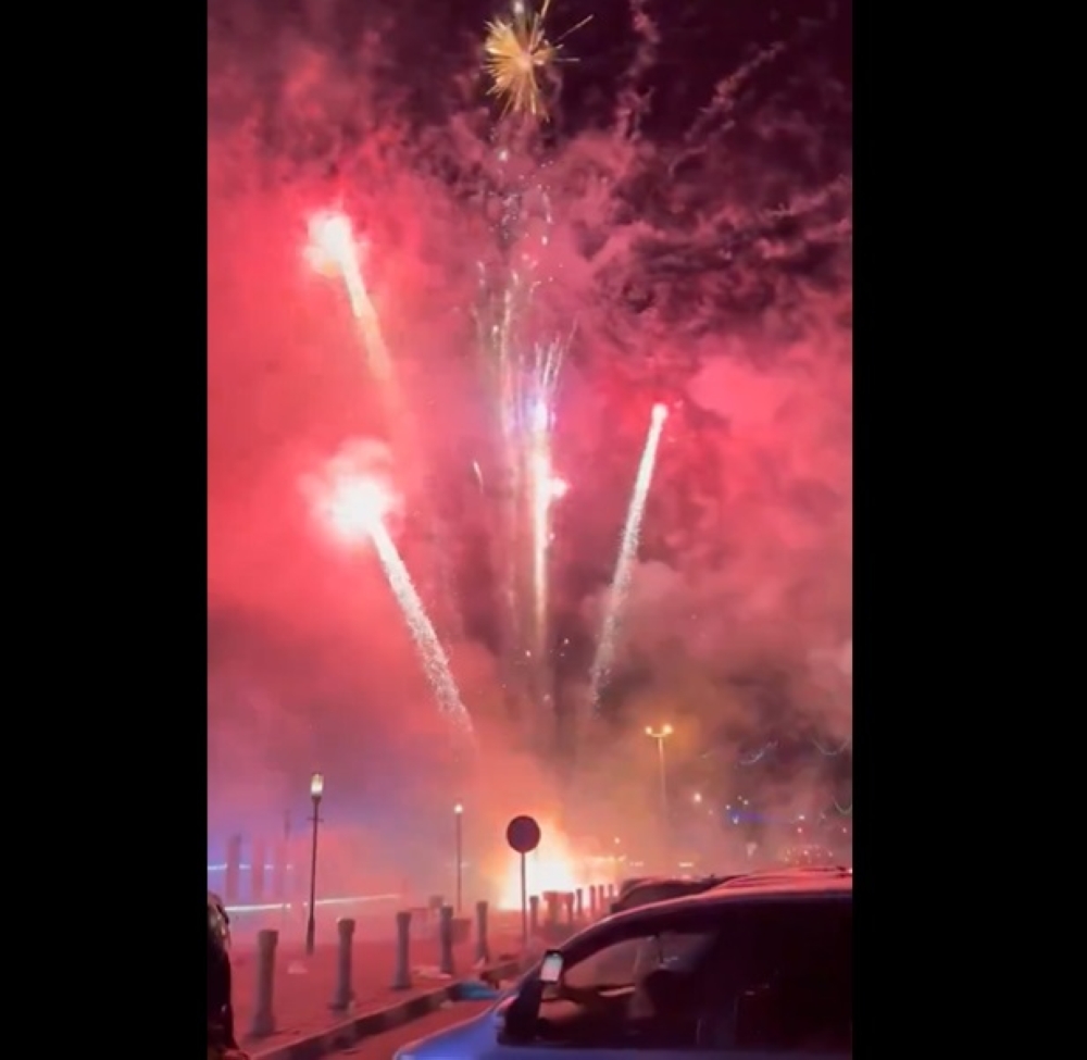 Police arrested two men for lighting up fireworks openly in a public place after the display spiralled out of control and sent visitors fleeing at Dataran Zero near the Sungai Petani bazaar at midnight yesterday. — Screengrab via X/Bernama 