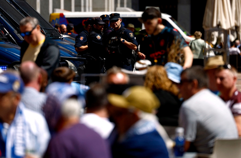 Police in Madrid ahead of the Champions League quarter finals match between Real Madrid and Manchester City April 9, 2024. — Reuters pic  