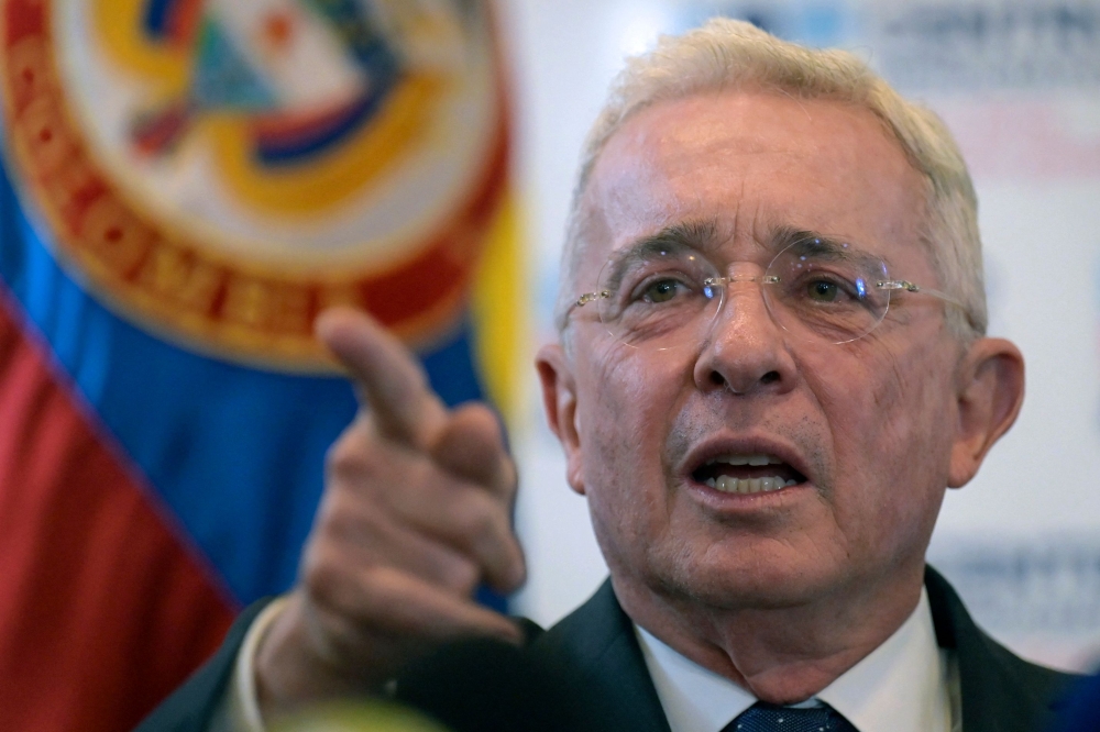 Colombia's prosecutor's office said on April 9, 2024, it would try former president Alvaro Uribe (pic) for alleged witness tampering in an investigation into his links to paramilitary groups. — AFP pic