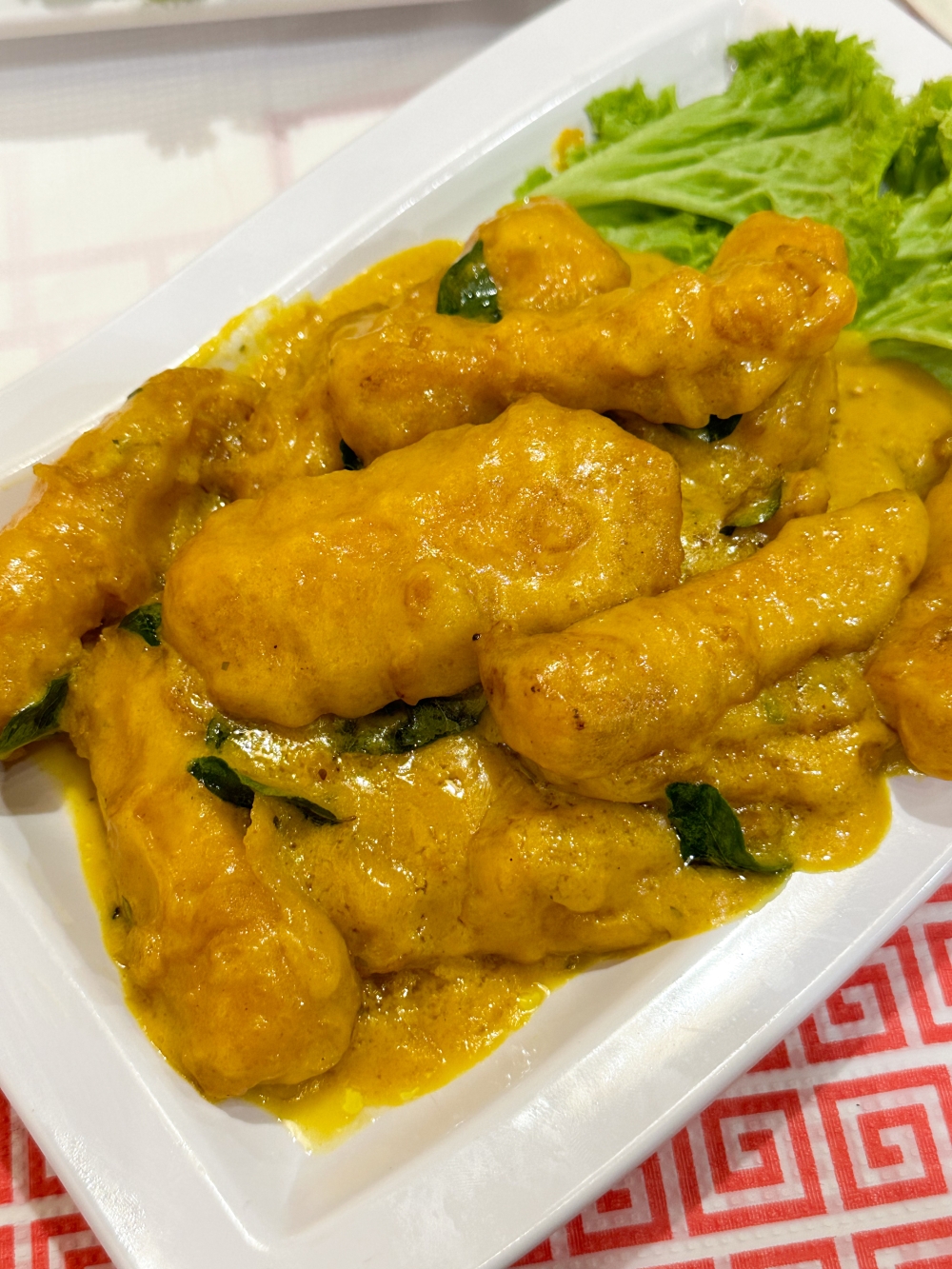 Pumpkin Tofu is best with rice as the smooth, silky beancurd is coated with a rich, not too sweet sauce.