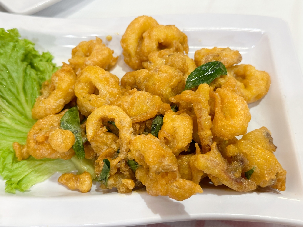 Salted Egg Sotong tends to be milder in flavour  but it's well prepared with a not too thick coating of batter.