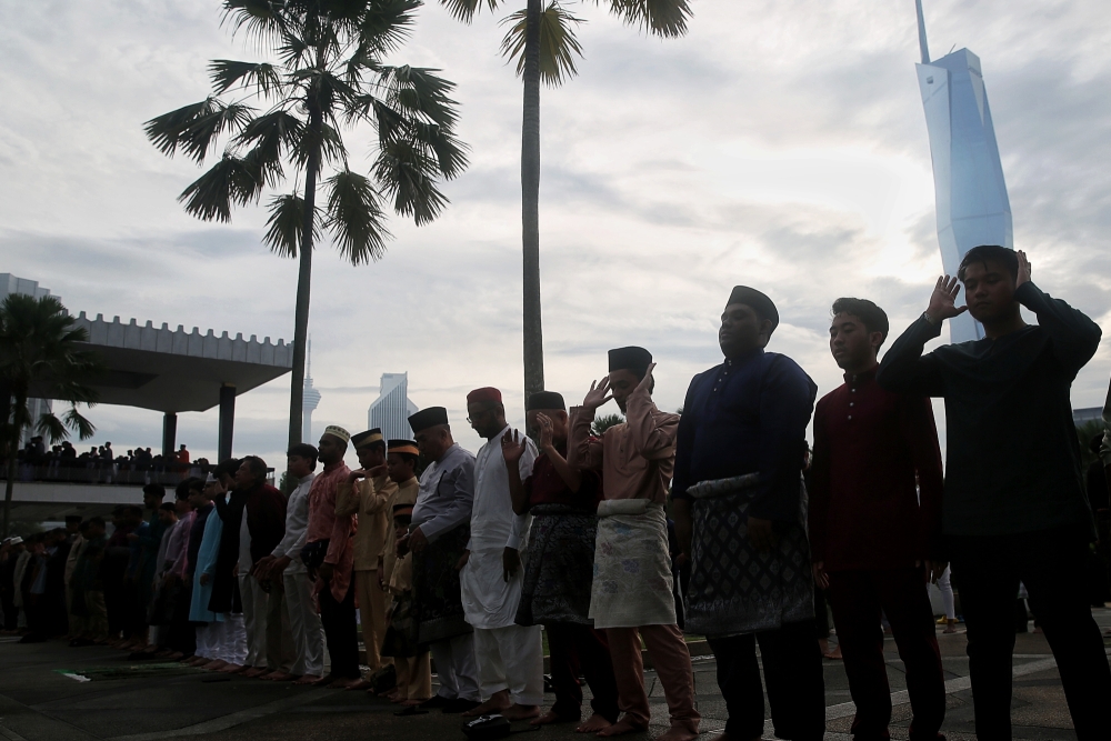 Muslims performing Aidilfitri prayers at the National Mosque in Kuala Lumpur April 10, 2024. ― Picture by Choo Choy May