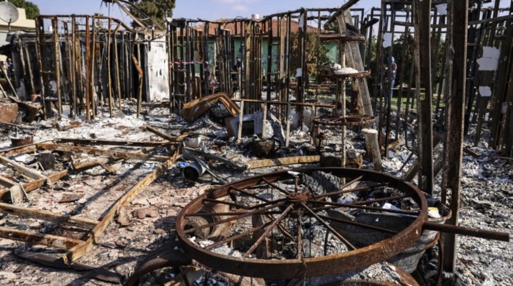 The burned-out home of the Inon family in Netiv Haasara, 500 metres from the Gaza fence. — AFP pic
