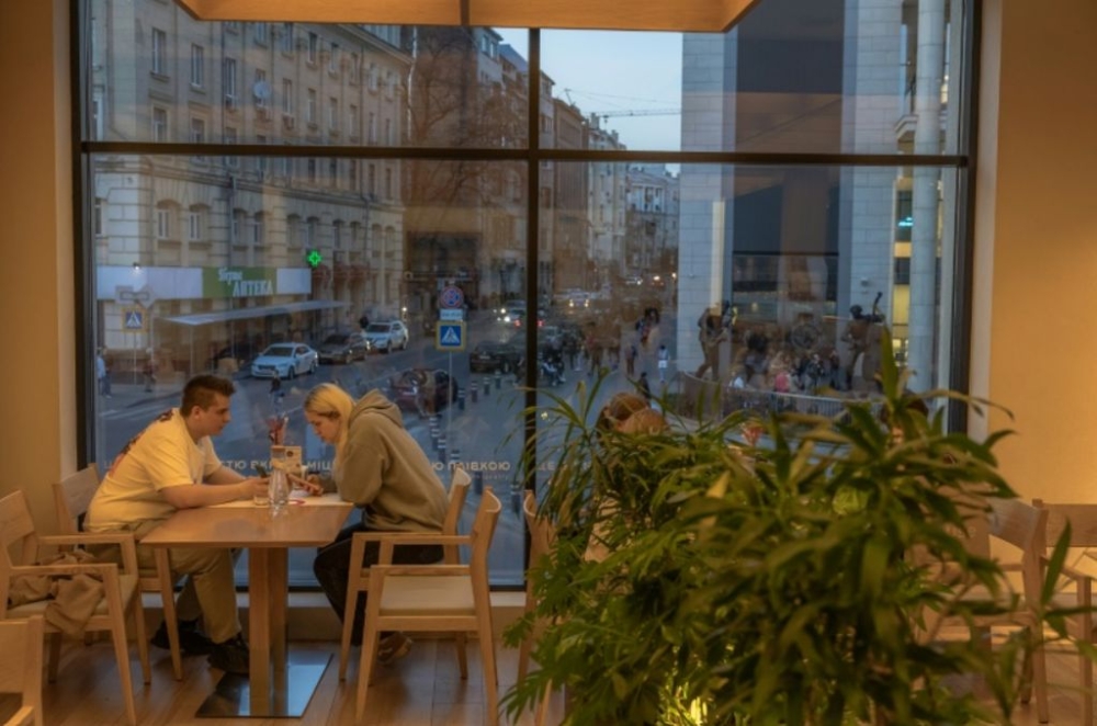 Clients sat in Kharkiv’s restaurants rarely react to air sirens. — AFP pic