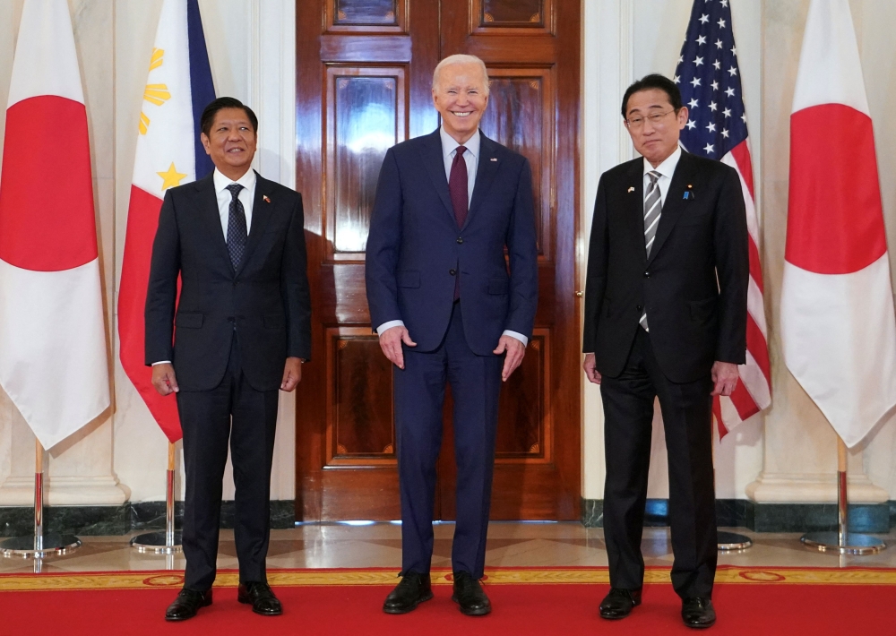 US President Joe Biden hosts Philippines President Ferdinand Marcos Jr. and Japan Prime Minister Fumio Kishida for a trilateral summit at the White House in Washington April 11, 2024. — Reuters pic