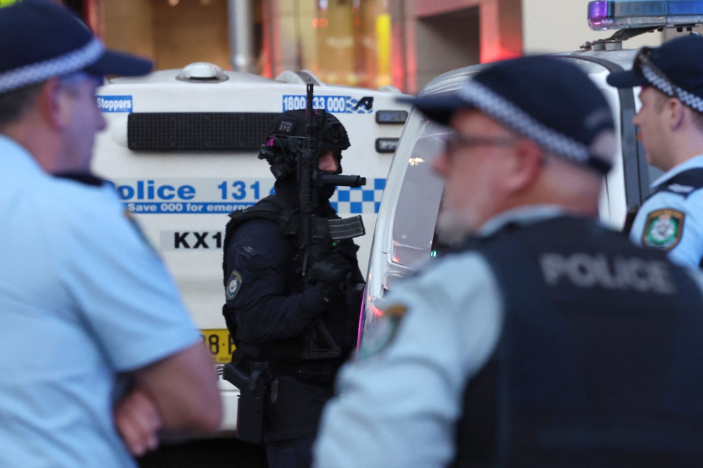 Police cordon off the area outside the Westfield Bondi Junction shopping mall after a stabbing incident in Sydney on April 13, 2024. — AFP pic