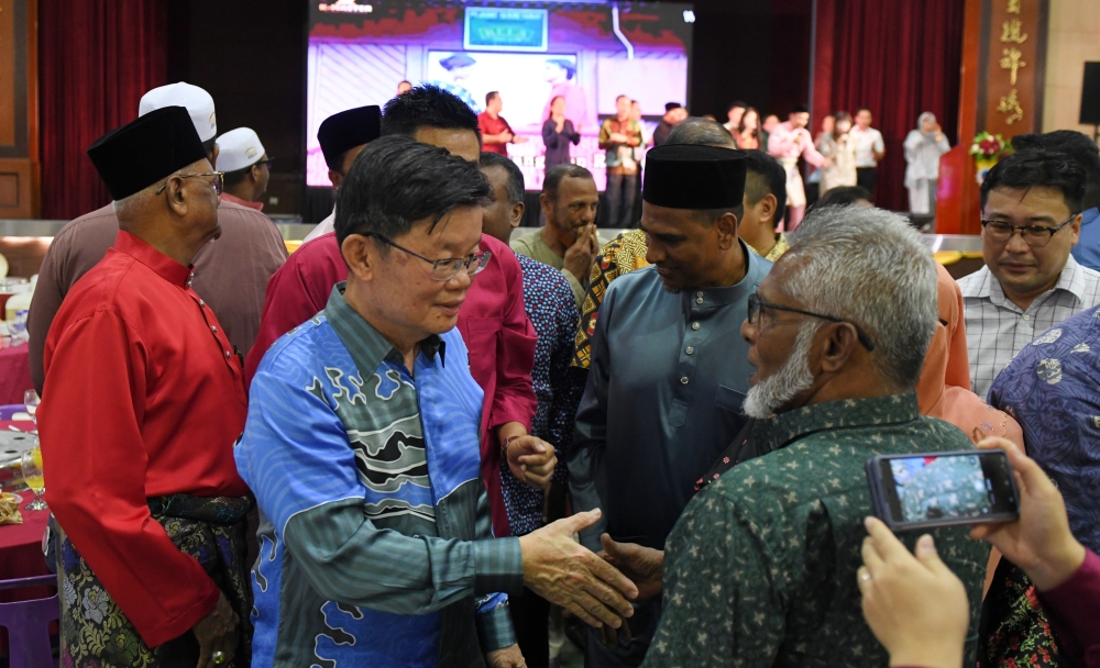 Penang DAP chairman Chow Kon Yeow greets guests at the Penang DAP Aidilfitri Open House at SJK(C) Shang Wu in George Town April 13, 2024. — Bernama pic