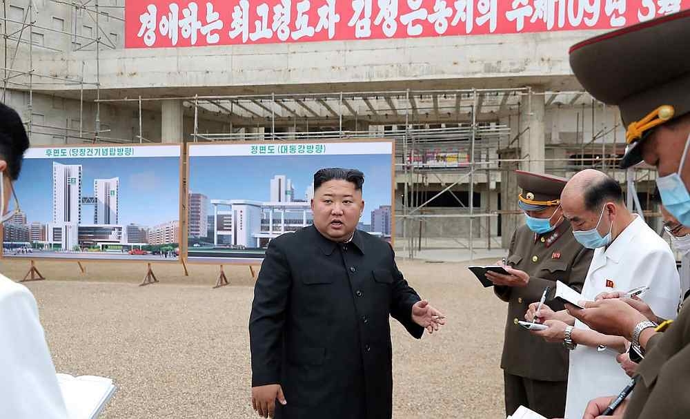 File photo of North Korean leader Kim Jong-un inspecting the Pyongyang General Hospital under construction July 20, 2020. - Korean Central News Agency handout via AFP