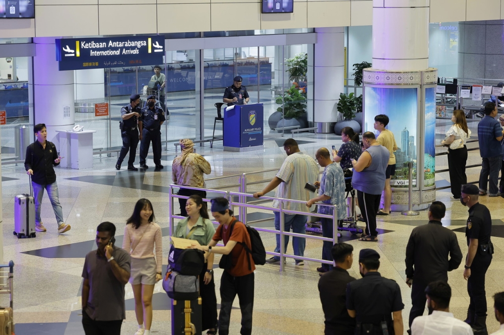 Police have tightened security at the Kuala Lumpur International Airport (KLIA) following a shooting at Terminal I Arrivals early in the morning, April 14, 2024. — Bernama pic