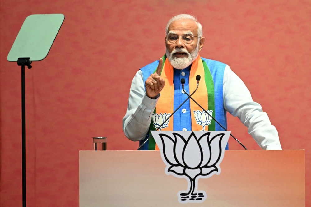 Indian Prime Minister Narendra Modi’s Bharatiya Janata Party (BJP) promised today to create jobs, boost infrastructure and expand welfare programmes if it wins a third term, seeking to address key voter concerns ahead of next week’s elections. — AFP pic
