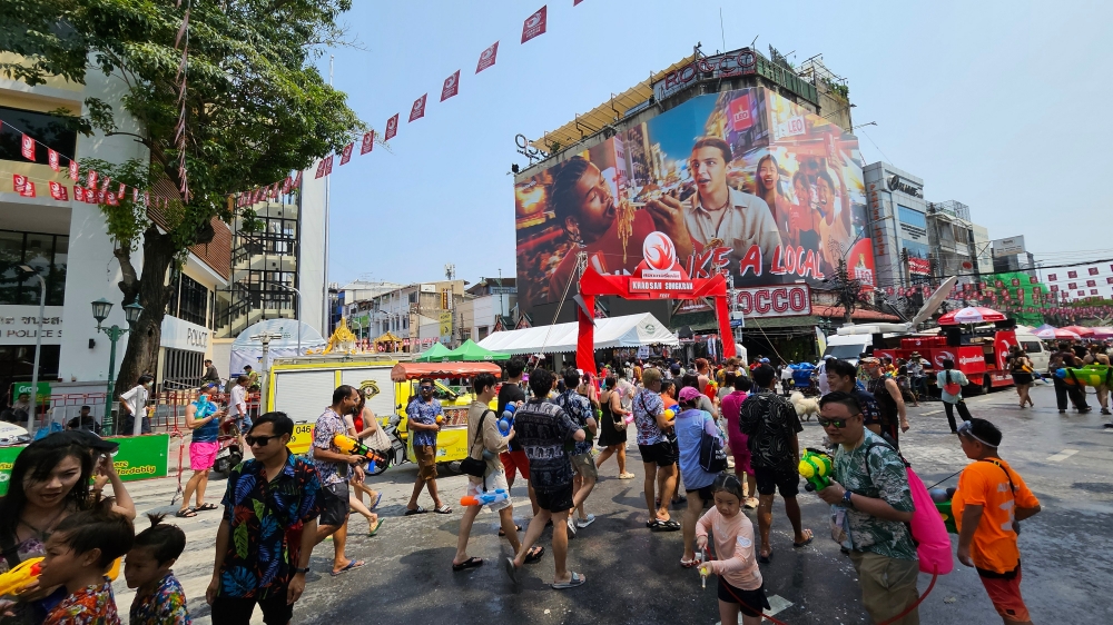 People celebrate the Songkran festival in George Town April 14, 2024. — Bernama pic