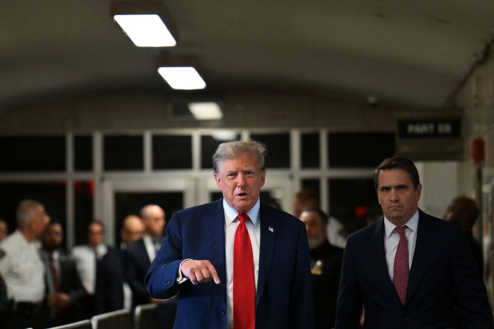 Former US President Donald Trump has said he plans to testify in his own defence, a risky proposition that would open him up to probing cross-examination by prosecutors. — Reuters pool pic