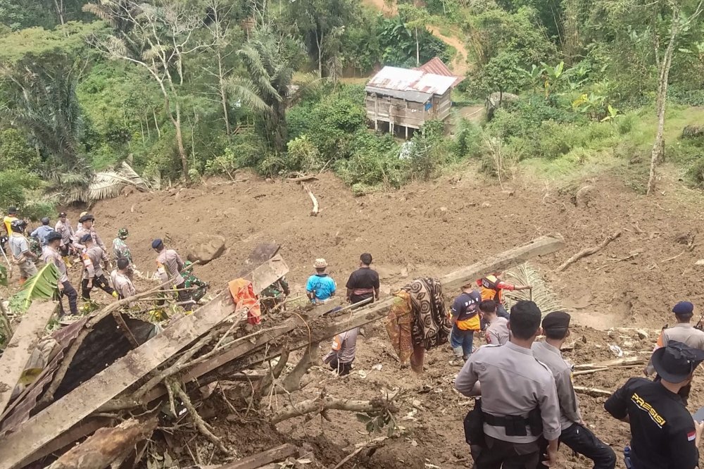 Indonesia landslide death toll rises to 20 as search ends