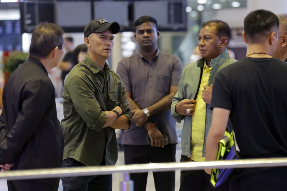 Director of the Bukit Aman Criminal Investigation Department, Datuk Seri Mohd Shuhaily Mohd Zain inspecting the scene of the shooting at Kuala Lumpur International Airport (KLIA) Terminal 1 Arrivals, April 14, 2024. — Bernama pic