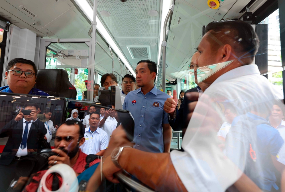 Johor Menteri Besar Datuk Onn Hafiz Ghazi rides a bus during the launch of the first cross-border electric bus service in Malaysia, Iskandar Puteri, April 16, 2024. — Bernama pic 