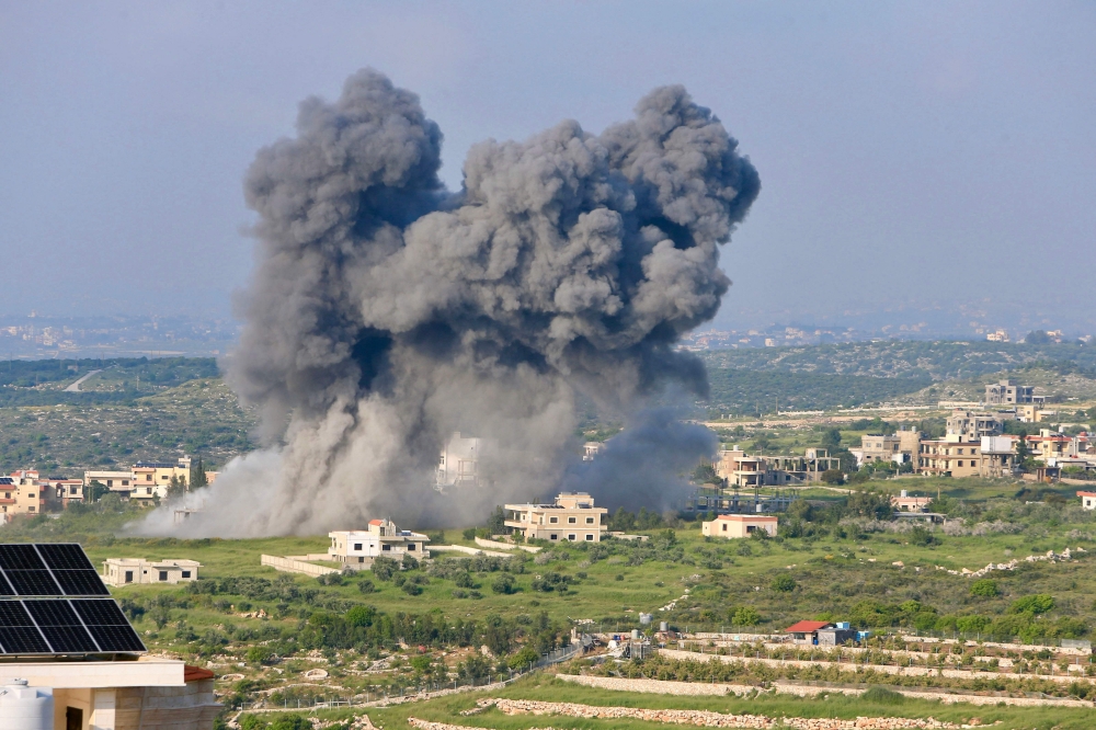 Smoke billows from the site of an Israeli airstrike on the southern Lebanese village of Majdel Zoun, on April 15, 2024, amid ongoing cross-border tensions as fighting continues between Israel and Palestinian Hamas militants in the Gaza Strip. — AFP pic